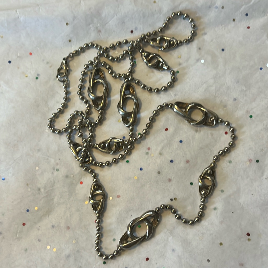 Long Silver Tone Necklace With Decorative Knots